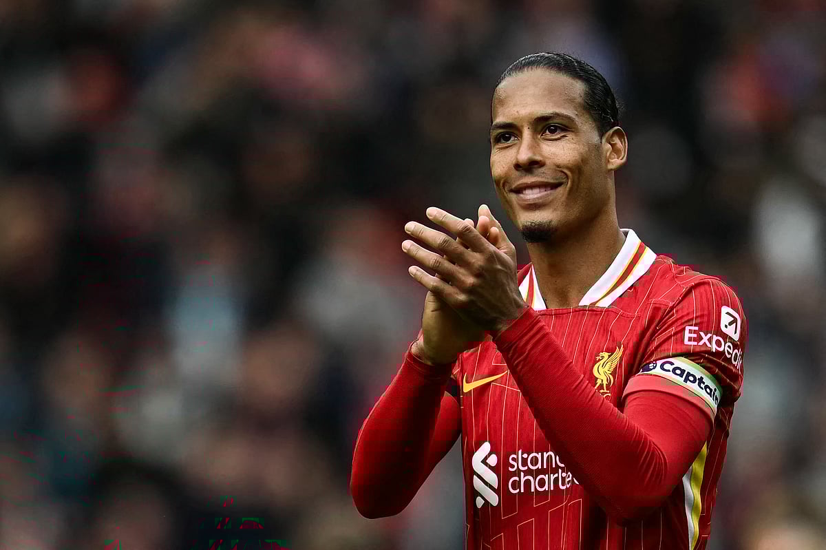 Liverpool's Dutch defender Virgil van Dijk applauds at the end of the English Premier League football match between Liverpool and West Ham United at Anfield in Liverpool, north west England.