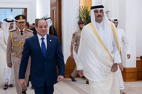Qatar's emir Sheikh Tamim bin Hamad Al Thani (right) during his meeting with Egypt's President Abdul Fattah Al Sissi in Doha on April 14, 2025. During the visit, Doha announced plans to invest $7.5 billion.