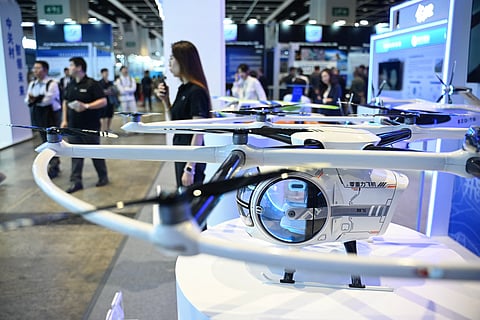 Models of the Zero Gravity ZG-ONE eVTOL aircraft are seen on display during the Hong Kong Electronics Fair at the Convention and Exhibition Centre in Hong Kong on April 14, 2025.