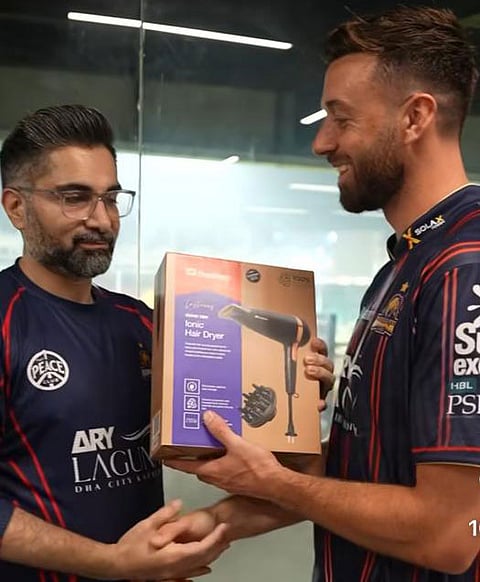 James Vince receiving a hair dryer as a present for his performance for Karachi Kings in the Pakistan Super League.
