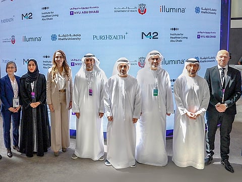 Top officials from the Department of Health – Abu Dhabi (DoH), PureHealth, Khalifa University of Technology (KU), Illumina, M42, the Institute for Healthier Living Abu Dhabi (IHLAD), and New York University Abu Dhabi (NYUAD), at Abu Dhabi Global Health Week 2025.