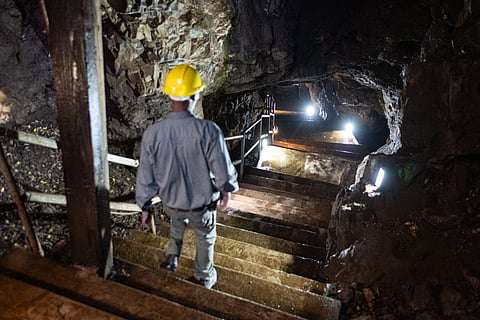Wits Sterkfontein caves tour guide, Keneth Mawete walks down into the cave located within the Cradle of Humankind UNESCO World Heritage Site in Krugersdorp near Johannesburg.