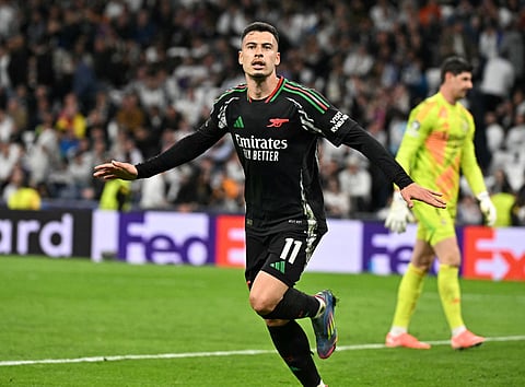 Arsenal's Brazilian midfielder Gabriel Martinelli celebrates after scoring his team's second goal during the Uefa Champions League quarter-final second leg against Real Madrid CF  at Santiago Bernabeu Stadium on Wednesday.