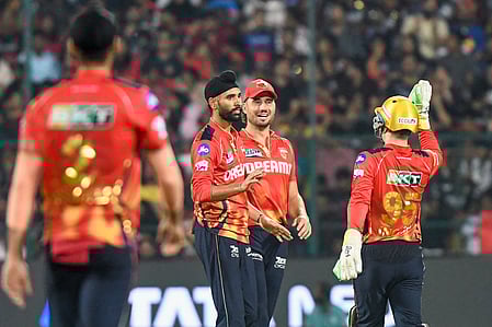 Arshdeep, Jansen and Chahal restricted RCB to 95/9 in rain-shortened clash with Punjab Kings in Indian Premier League (IPL) 2025 at the M. Chinnaswamy Stadium in Bengaluru on Friday.  IANS Photos
