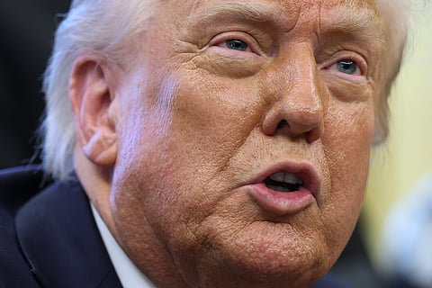 S. President Donald Trump speaks to reporters after signing a proclamation in the Oval Office at the White House.