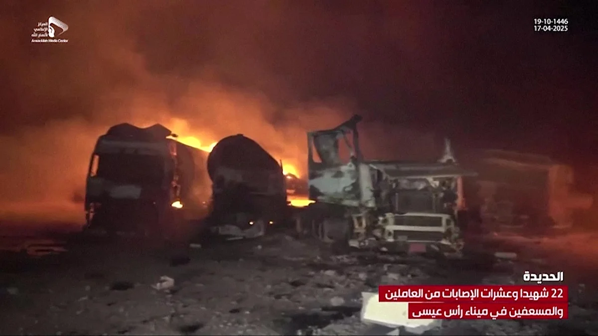 This grab taken from footage released by Al Masirah TV station of Yemen's Houthis shows fire and destruction at the site of US strikes on the Ras Issa fuel port in western Yemen on April 18, 2025.