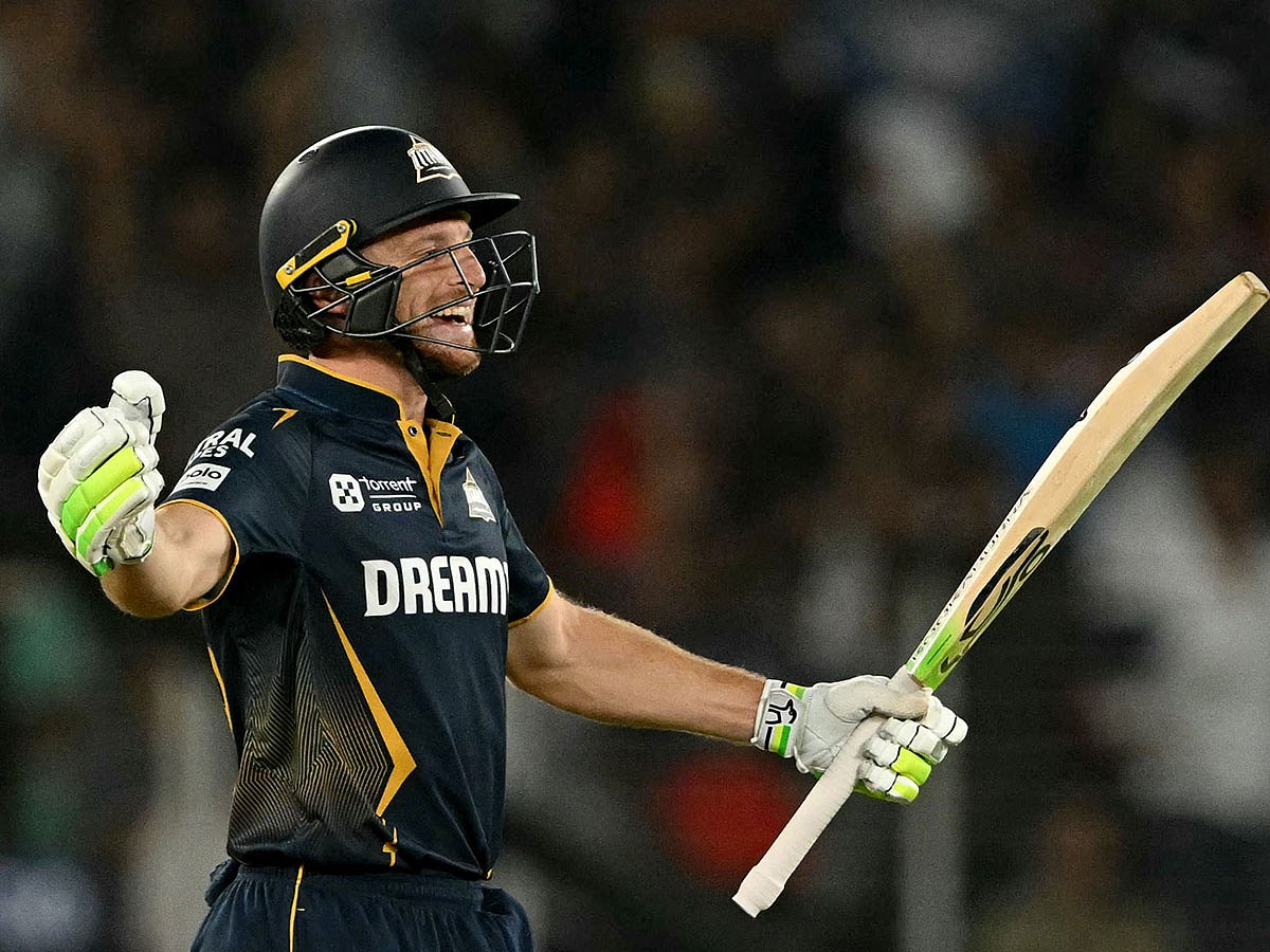 Gujarat Titans' Jos Buttler celebrates after winning the Indian Premier League (IPL) Twenty20 match against Delhi Capitals in Ahmedabad on Saturday.