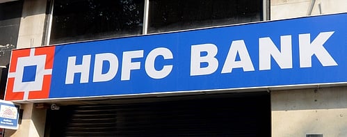 According to eyewitnesses, two men wearing helmets and burqas first entered the bank premises. Moments later, they were joined by four more persons.