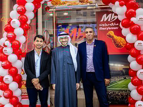 Ali Ebrahim Al Abbas, CEO of Al Abbas Group, Yasir Khushi, CFO of Al Abbas Group & Ashraf Elbahrawi, General Manager of Marrybrown UAE at the opening event