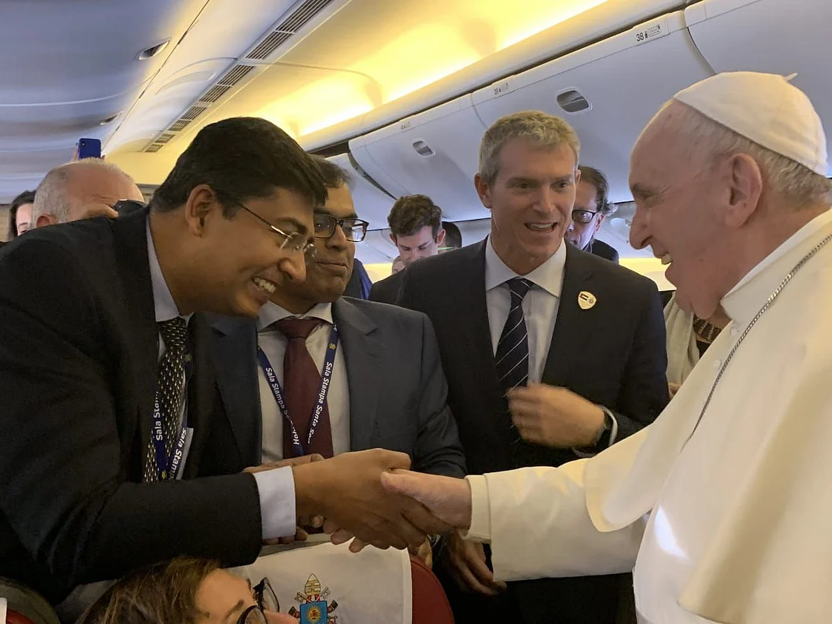 Pope Francis with Alex Abraham, International Editor- Gulf News on the flight;  