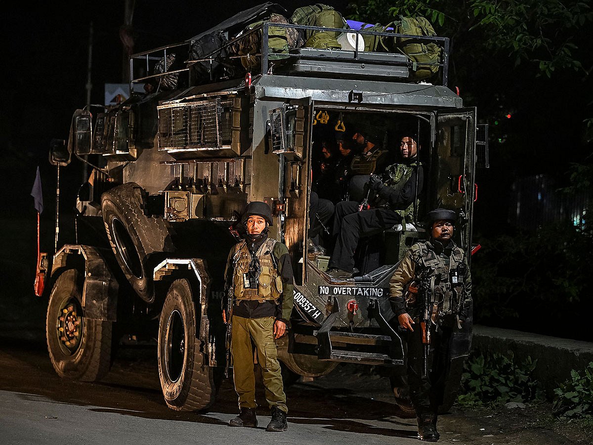 Indian army personnel stand guard near Pahalgam, south of Srinagar.