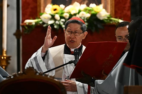 Cardinal Tagle with Fr Lenny Escalada (left), St. Mary's Church's Parish Priest, and Bishop Paolo Martinelli, Apostolic Vicar of Southern Arabia.