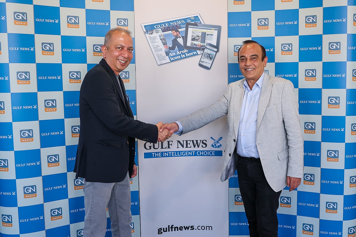 Vijay Vaghela (right), Interim CEO, Gulf News, and Shekhar Iyer, Director and General Manager at BMEG ME FZ LLC, after signing the partnership deal between Gulf News and Magzter. 