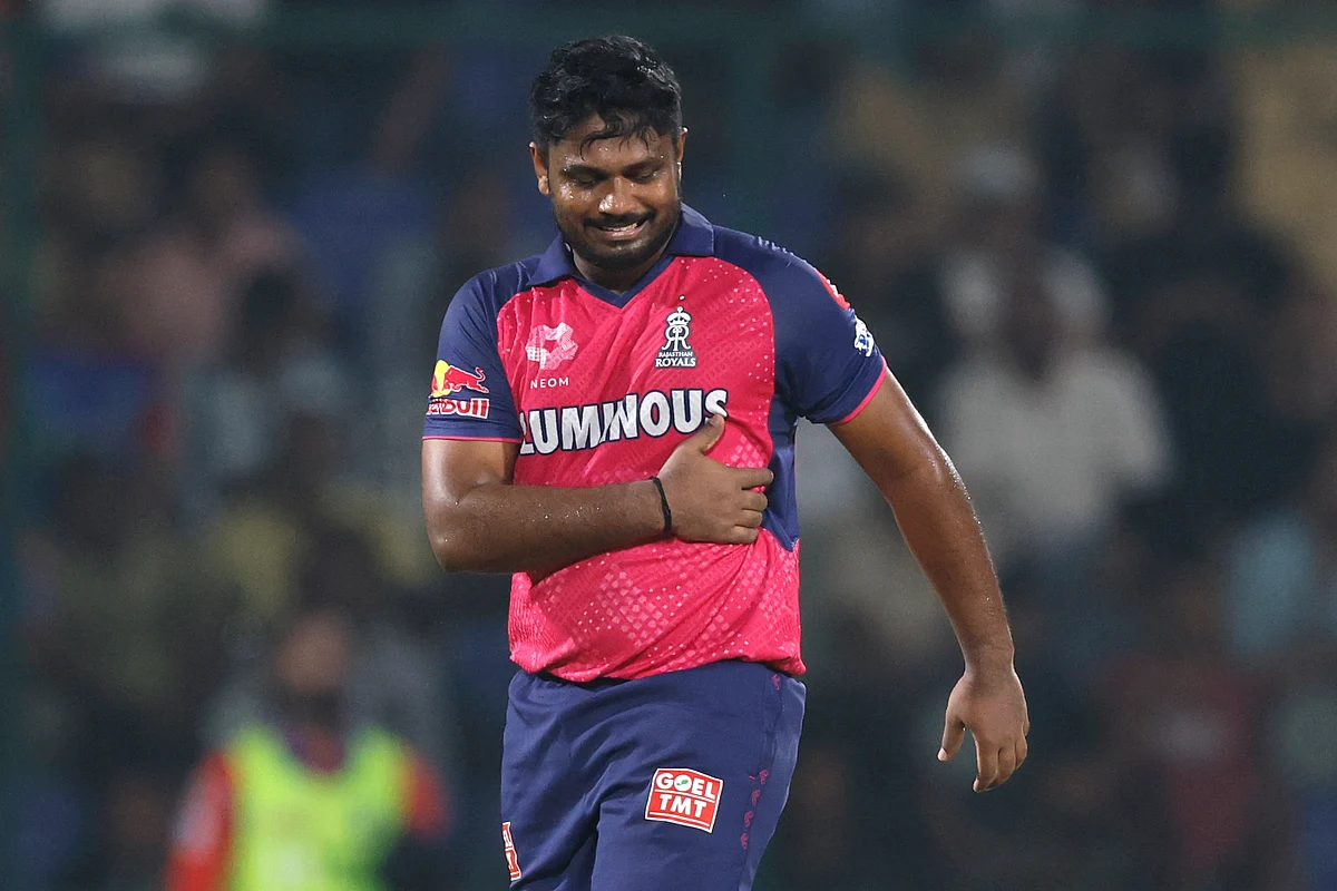 Rajasthan Royals skipper Sanju Samson walks back after suffering a side strain during the match against Delhi Capitals in the Indian Premier League Season 18.