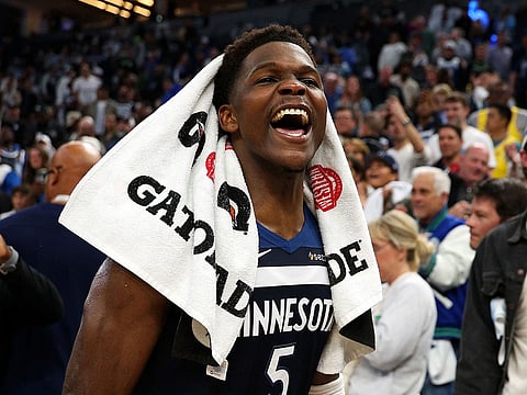 Anthony Edwards #5 of the Minnesota Timberwolves celebrates the win against the Los Angeles Lakers.