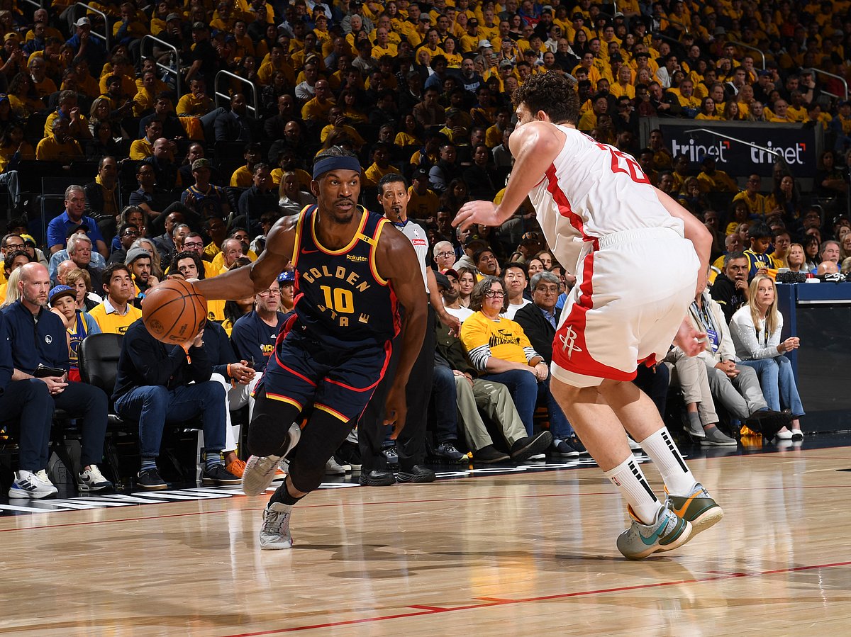 Jimmy Butler drives to the basket during the game against the Houston Rockets during Round One Game Four of the 2025 NBA Playoffs.