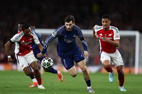 Paris Saint-Germain's Georgian forwardKhvicha Kvaratskhelia controls the ball during the UEFA Champions League Semi-final First Leg football match against Arsenal at the Emirates Stadium in north London, on April 29.