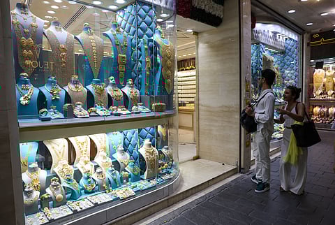 Stock Gold   Shoppers at gold souq in Deira. 