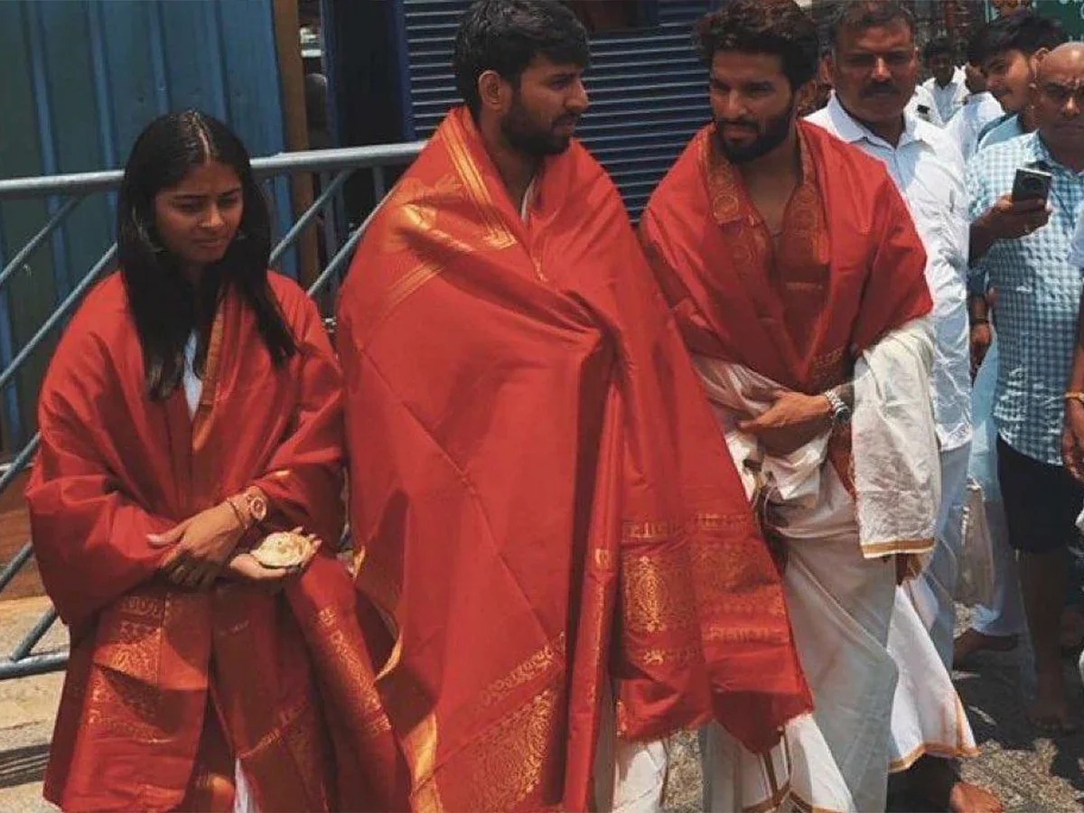 Rajat Patidar, Jitesh Sharma and Shreyanka Patil visit Tirumala temple.
