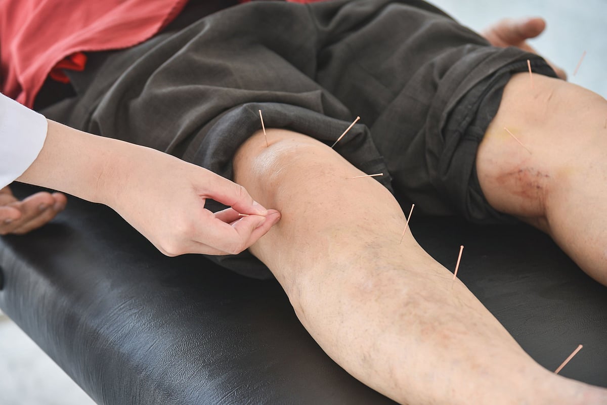 A probe was launched into 'flesh-eating infection' after bacteria were found on patient shorts used at an acupuncture clinic.