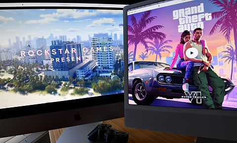This illustration photo created in Los Angeles, California, on December 5, 2023, shows Rockstar Games’ Grand Theft Auto 6 trailer played on computer screens.