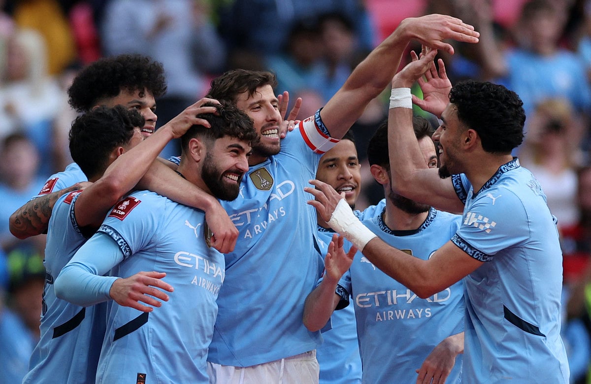 Manchester City players celebrate during the English FA Cup semi-final. The club has grown in leaps and bounds since the takeover by Abu Dhabi's City Football Group.