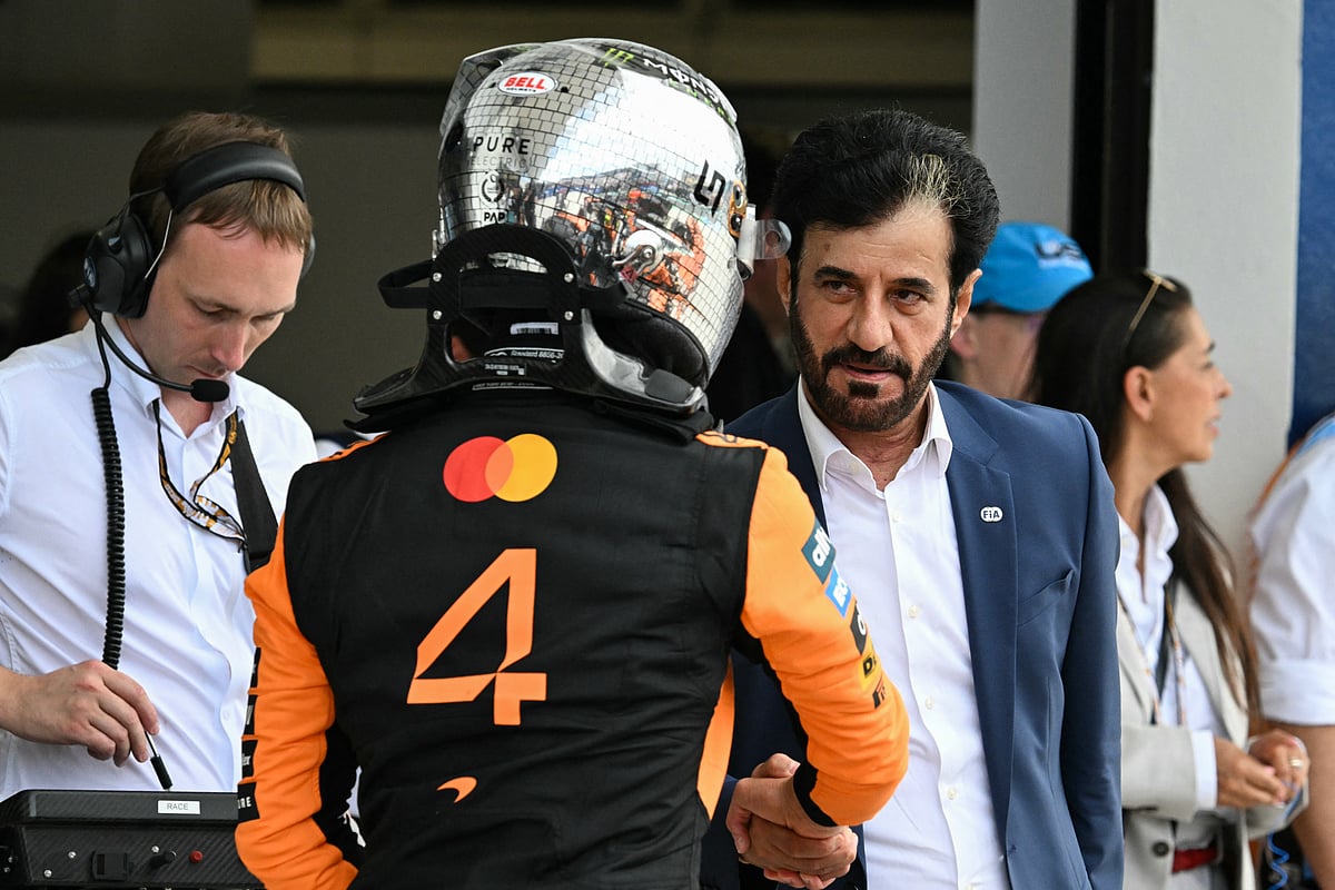 McLaren's British driver Lando Norris with Mohammed Ben Sulayem.