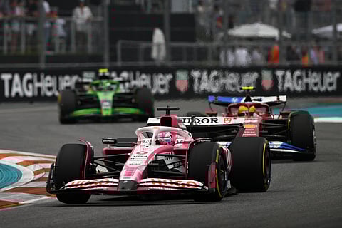 Isack Hadjar of France leads Lewis Hamilton of Great Britain and Gabriel Bortoleto of Brazil on track during the F1 Grand Prix of Miami at Miami International Autodrome on May 04 in Miami, Florida.