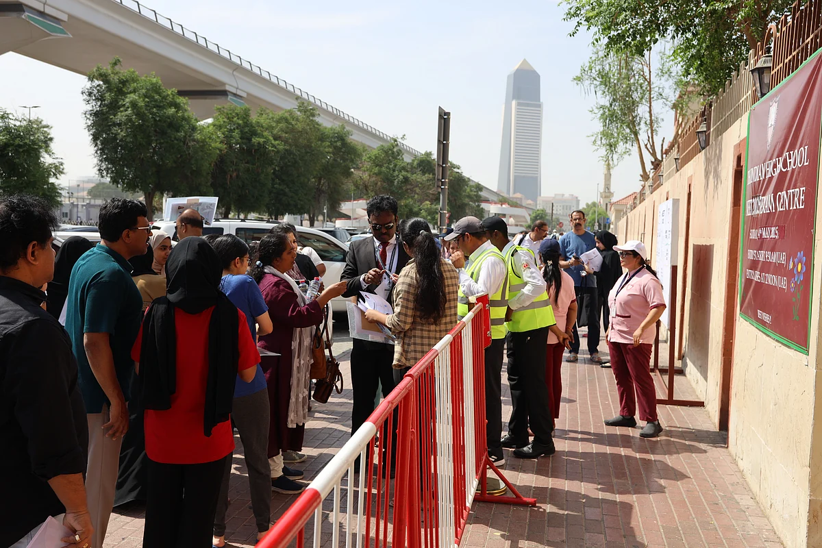 Students had to go through different levels of security checks. Seen here are candidates who sat for NEET-UG 2025 along with their parents and school employees on exam duty at The Indian High School, Oud Metha in Dubai on Sunday