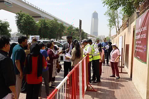 Students had to go through different levels of security checks. Seen here are candidates who sat for NEET-UG 2025 along with their parents and school employees on exam duty at The Indian High School, Oud Metha in Dubai on Sunday