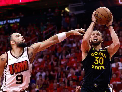 Stephen Curry #30 of the Golden State Warriors shoots the ball against Dillon Brooks #9 of the Houston Rockets during the fourth quarter in Game Seven of the Western Conference First Round NBA Playoffs at Toyota Center on May 04, 2025 in Houston, Texas.