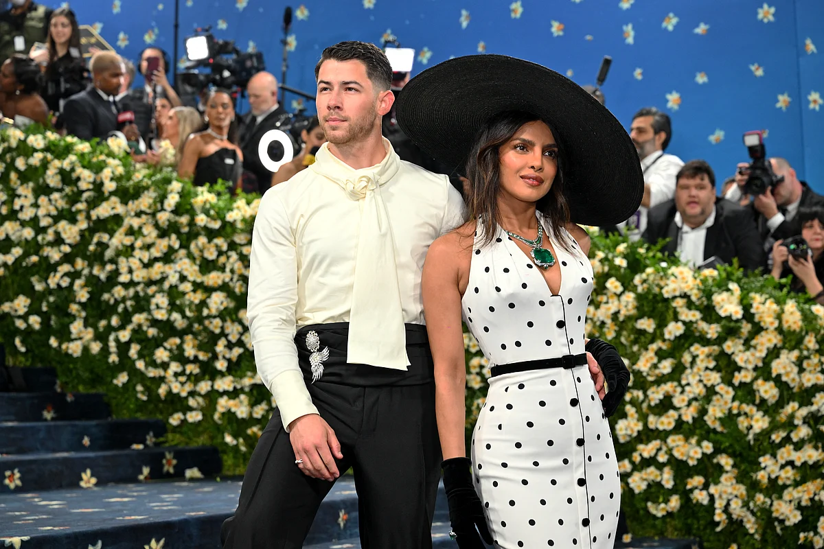 Go big,  bling or go home! Check out Priyanka Chopra Jonas with Nick Jonas wearing a 241-carat Emerald at this year's Met Gala.