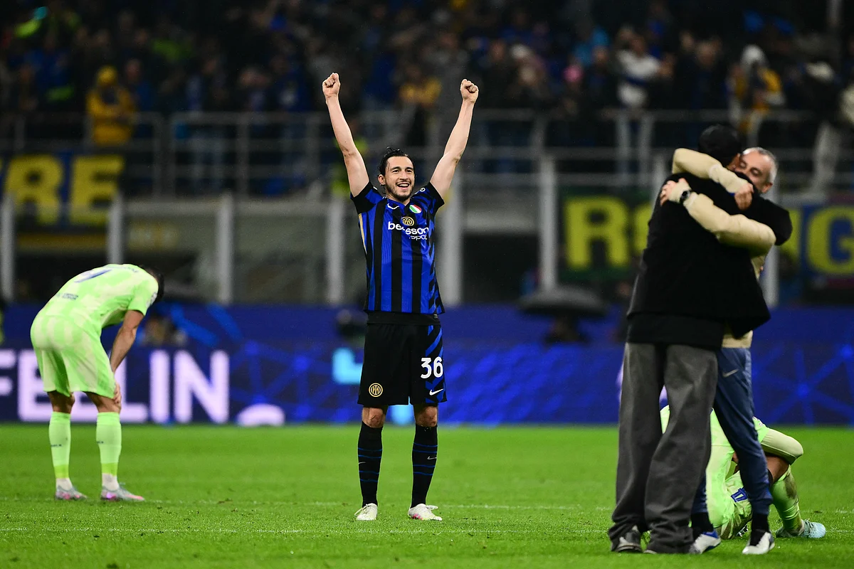 Inter Milan's Italian defender Matteo Darmian celebrates after Inter Milan won the UEFA Champions League semi-final second leg football match against FC Barcelona at the San Siro stadium in Milan on May 6.