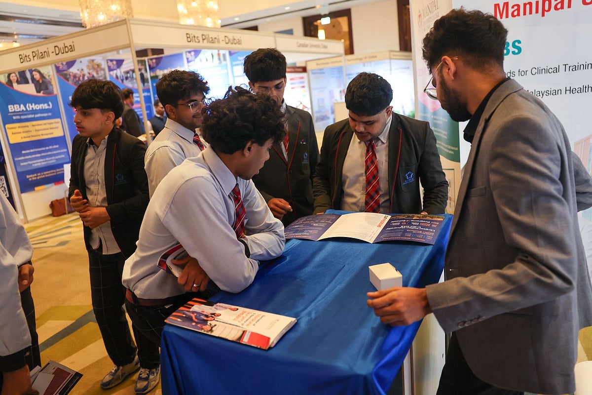 High school students exploring courses at Edufair 