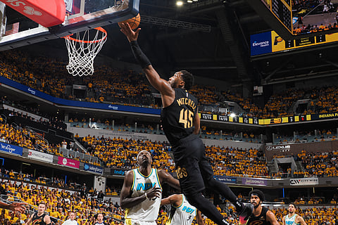 Donovan Mitchell of the Cleveland Cavaliers drives to the basket and goes for a layup using his left hand against the Indiana Pacers during Round Two Game Three of the 2025 NBA Playoffs on May 9, 2025.