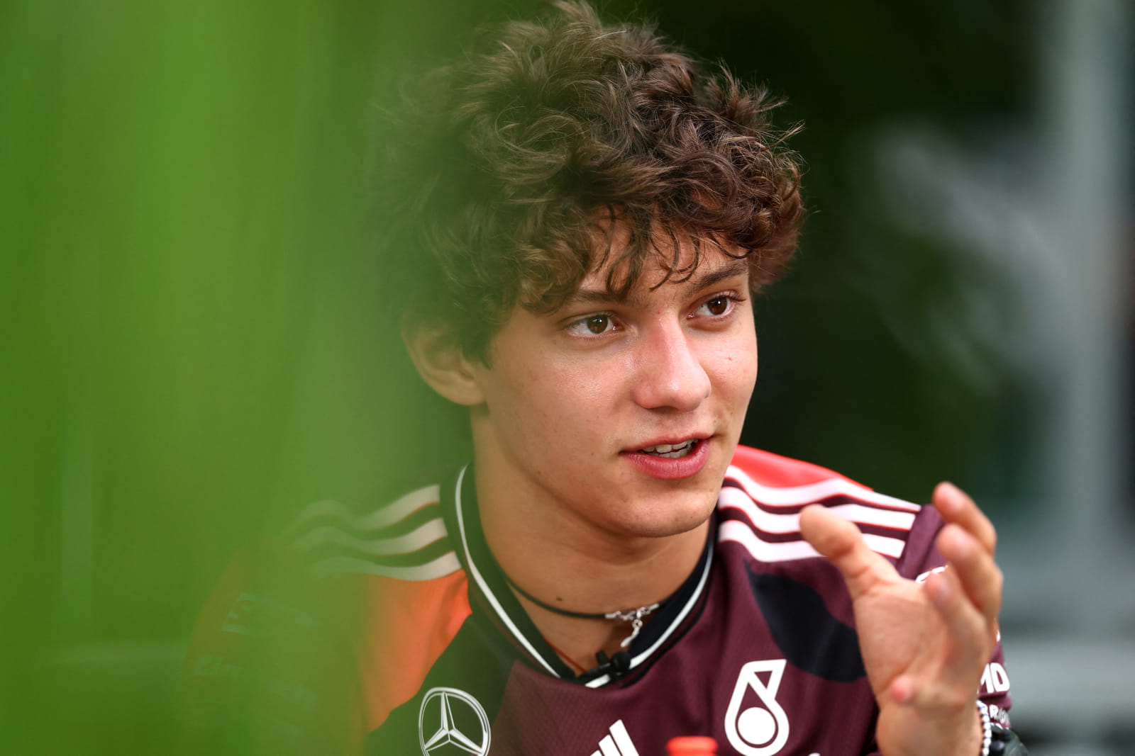 Andrea Kimi Antonelli of Italy and Mercedes AMG Petronas F1 Team looks on in the Paddock.