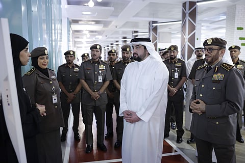 Sheikh Ahmed bin Mohammed bin Rashid Al Maktoum with Lieutenant General Mohammed Ahmed Al Marri during his visit to the GDRFA office in Dubai
