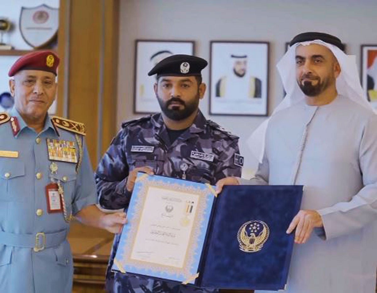 Sheikh Saif bin Zayed honours the police official