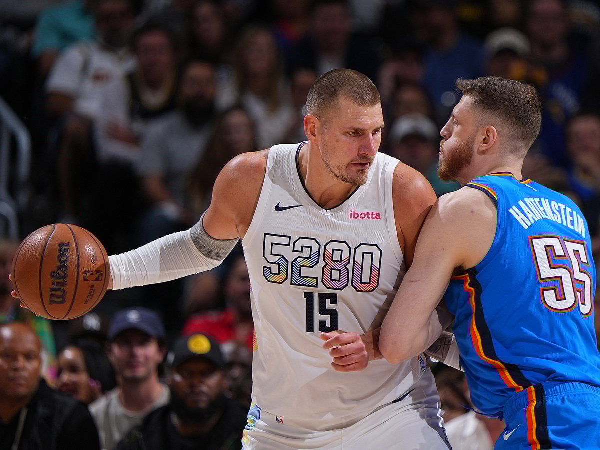 Isaiah Hartenstein of the Oklahoma City Thunder plays defense on Nikola Jokic of the Denver Nuggets during Round 2 Game 6 of the 2025 NBA Playoffs on May 15, 2025 at Ball Arena in Denver, Colorado.