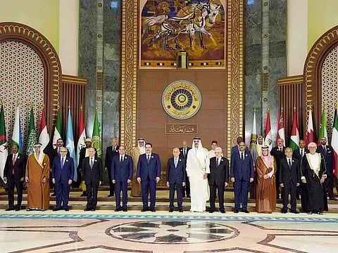 Arab leaders pose for a group photo ahead of the opening session of the 34th Arab League summit in Baghdad on May 17, 2025. 