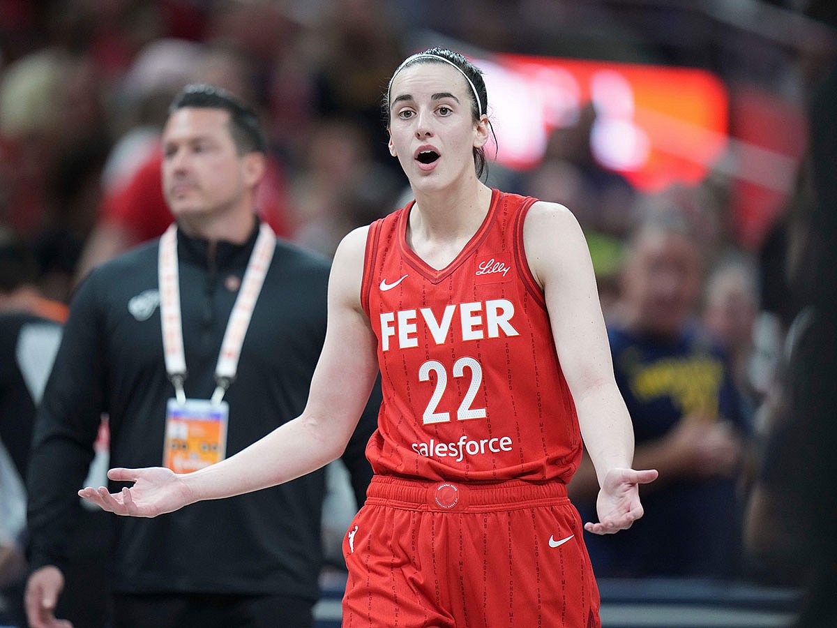 Indiana Fever guard Caitlin Clark (22) reacts after being called for a flagrant foul on Chicago Sky forward Angel Reese.