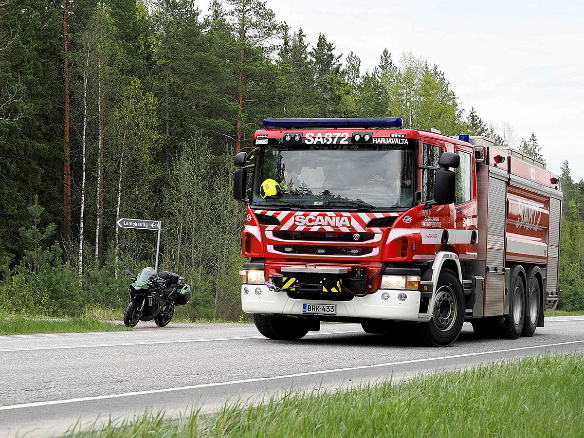A fire department vehicle arrives at the crash site near the Eura Airfield in Eura, Finland.