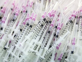 Covid test, vaccine maker stocks jump as cases surge in Asia