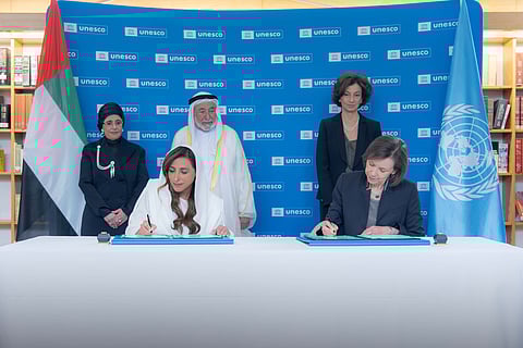 The signing took place Wednesday morning at the UNESCO headquarters in Paris.