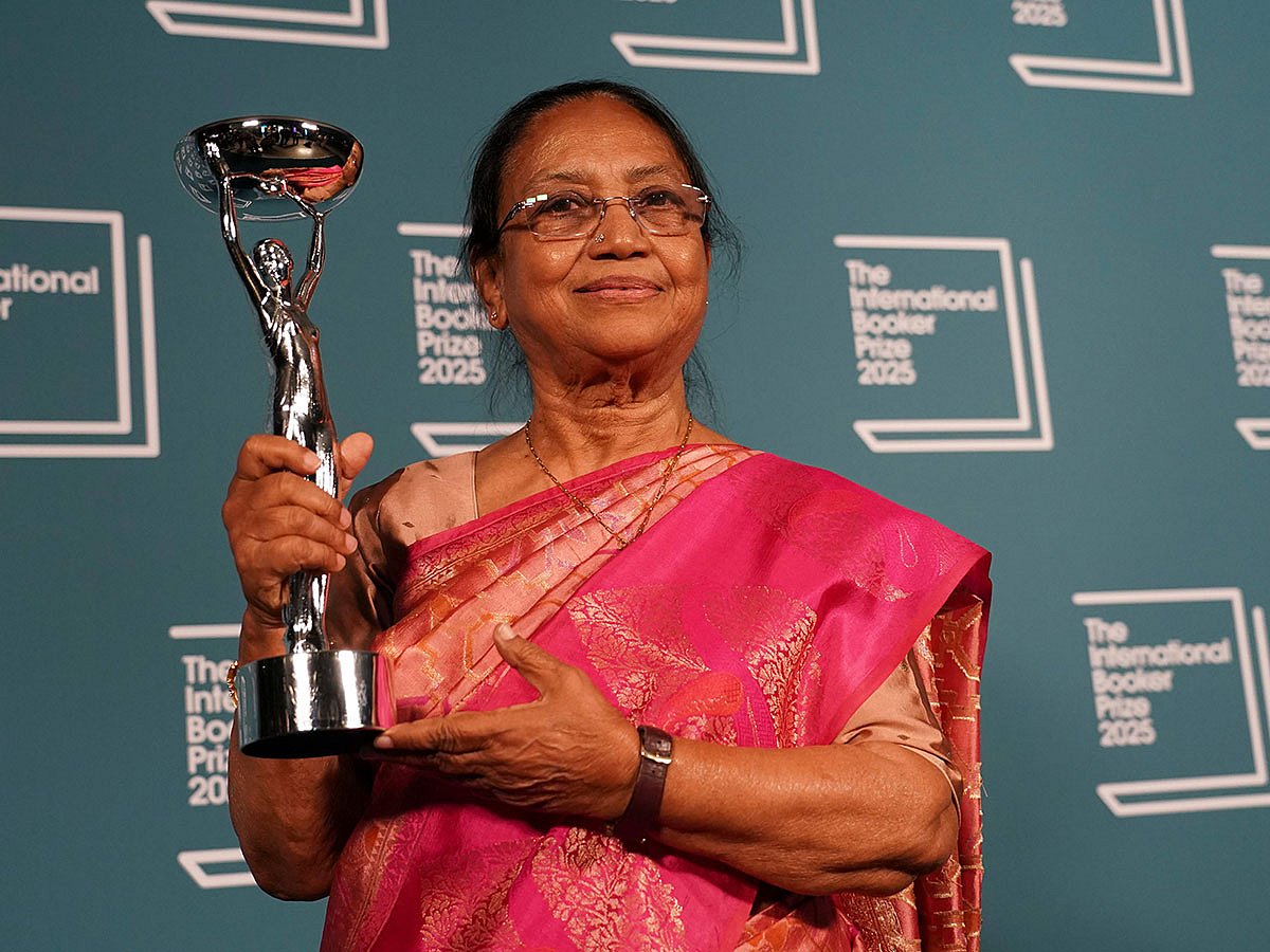 Banu Mushtaq, author of 'Heart Lamp' holds the trophy after winning the International Booker Prize, in London
