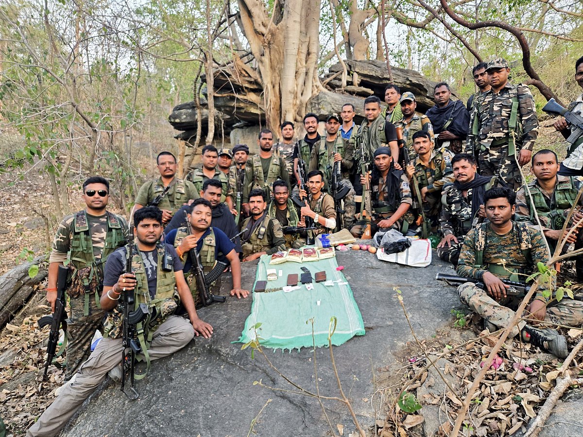 Security personnel with materials seized from Naxalites recently.