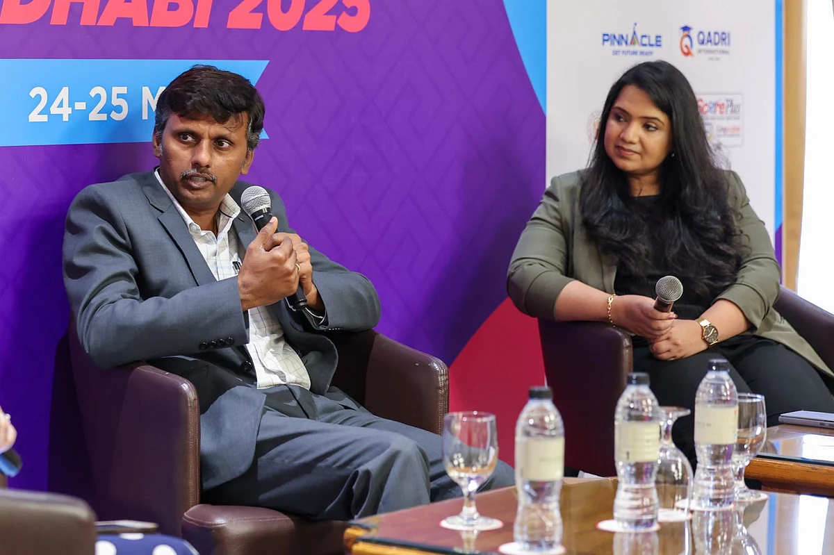 Dr Tamizharasan, Assistant Professor & Deputy Head of Department of Computer Science, BITS Pilani, Dubai Campus, and Prof. Elsa Ashish Thomas, Chairperson of the Manipal Institute of Liberal Arts (MILA) at MAHE Dubai, speaking at the panel titled 'Building human-centric competence in tech-heavy times'  


