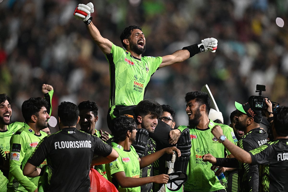 Lahore Qalanders' players carry teammate Sikandar Raza as they celebrate their victory in the Pakistan Super League (PSL) Twenty20 final against Quetta Gladiators at the Gaddafi Stadium on Sunday.