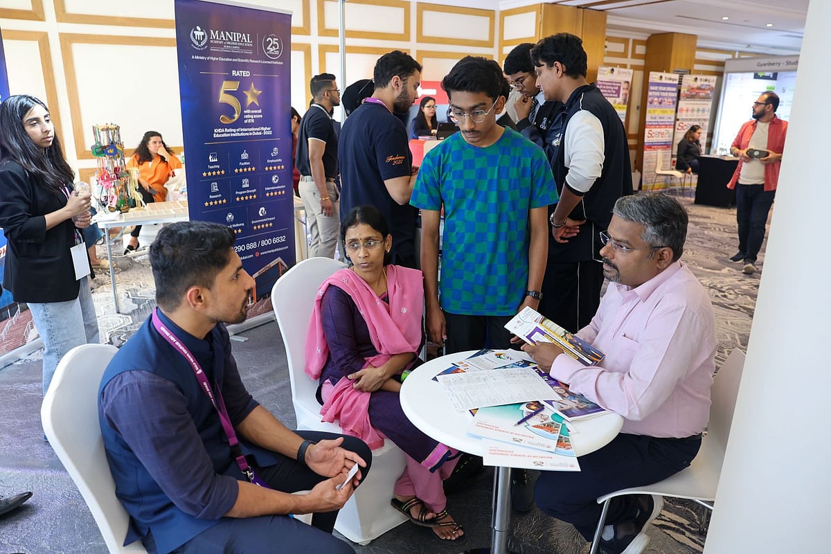 Families interacting with representatives of higher education institutions at Edufair Abu Dhabi 