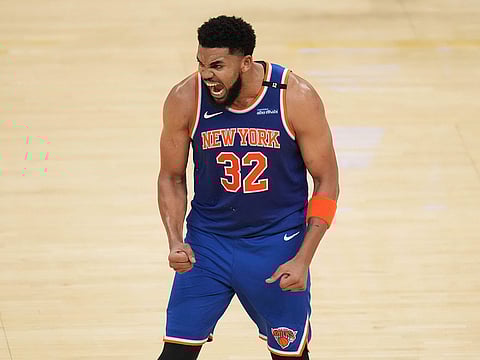 New York Knicks center Karl-Anthony Towns (32) reacts after scoring against the Indiana Pacers during the second half of Game 3 of the Eastern Conference finals of the NBA basketball playoffs.